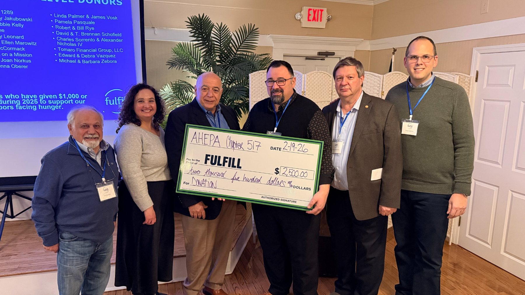 AHEPA Chapter 517 members presenting a donation to Fulfill